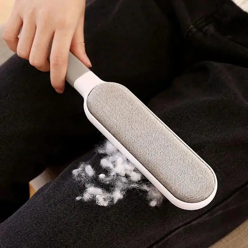 Brosse anti-peluches double face pour animaux de compagnie